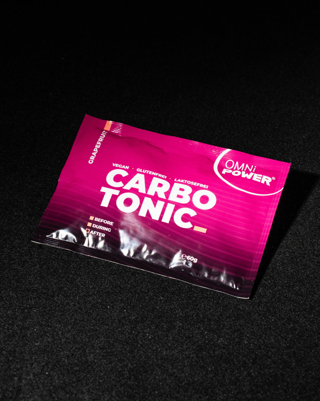 OMNi-POWER® CARBOTONIC Sachet (Grapefruit, 60 g) – Packshot